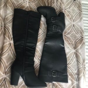 Never worn knee high black leather boots